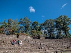 A few students sitting on the amphitheatre